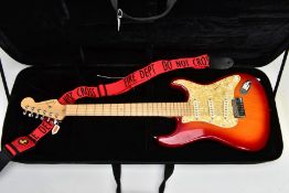 A 2004 FENDER STRATOCASTER DELUXE, manufactured at the Corona, Caliafornia, USA factory, Serial No