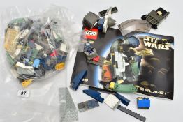 AN UNBOXED LEGO STAR WARS JANGO FETT'S SLAVE I No 7153, in used condition, missing Mini Figures