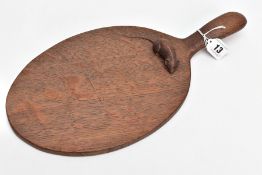 A ROBERT 'MOUSEMAN' THOMPSON OAK CHEESE BOARD, dark oak oiled finish, oval form, length 36.5cm