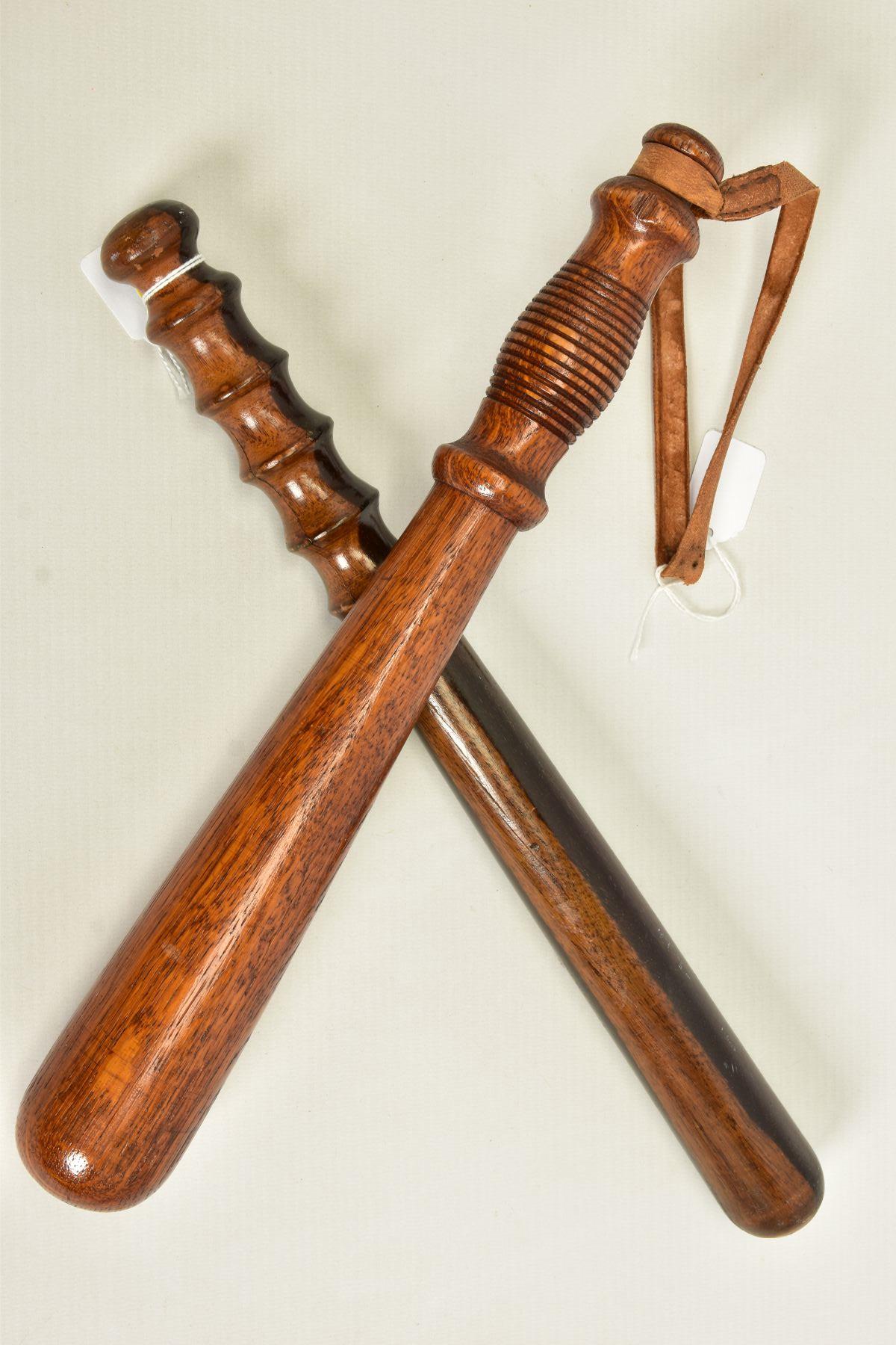 TWO POLICE TRUNCHEONS, (2)