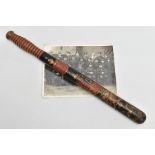 A VICTORIAN TURNED AND PAINTED WOODEN TRUNCHEON, ebonised and polychrome decorated with VR over