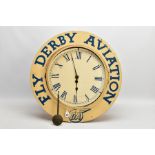 ADVERTISING/AVIATION INTEREST, a cream and blue painted wooden cased wall clock, the circular