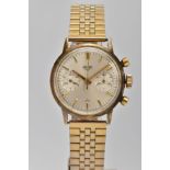 A 1950'S HEUER TWIN DIAL CHRONOGRAPH GOLD PLATED WRISTWATCH, the circular face with silvered dial,