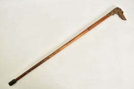 AN ANTIQUE OBSOLETE CALIBRE 9.1MM X 40R CENTRE FIRE CALIBRE WALKING CANE, fitted with a high quality