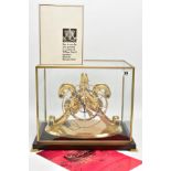 AN EMPEROR CLOCK COMPANY BRASS EPICYCLIC CLOCK UNDER RECTANGULAR GLAZED CASE, with wooden base,