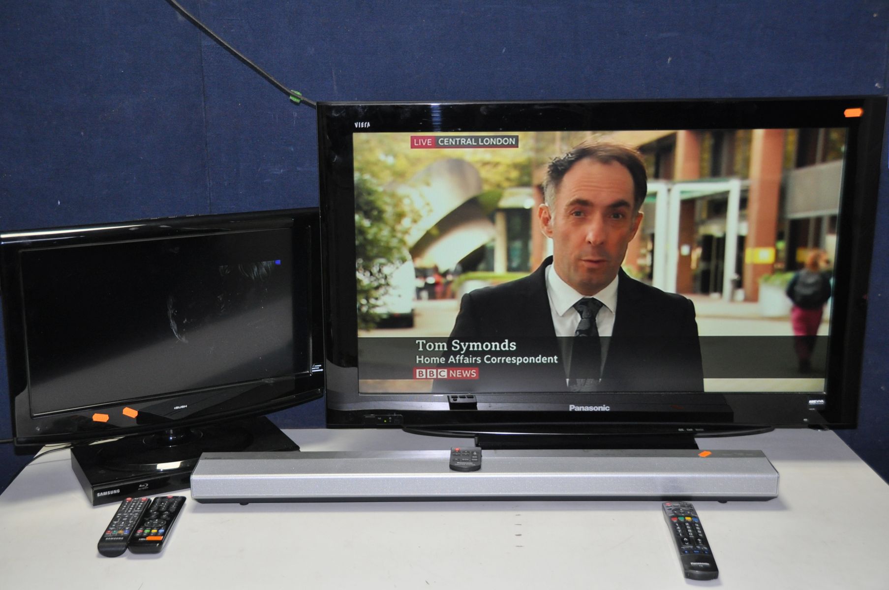 A PANASONIC TX-37LZD81 37in TV with a Bush A322D 22in TV, a Samsung DVD player and a Panasonic SC- - Image 2 of 3