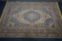 A 20TH CENTURY PERSIAN WOOL RUG, with light blue and cream ground, 199cm x 139cm