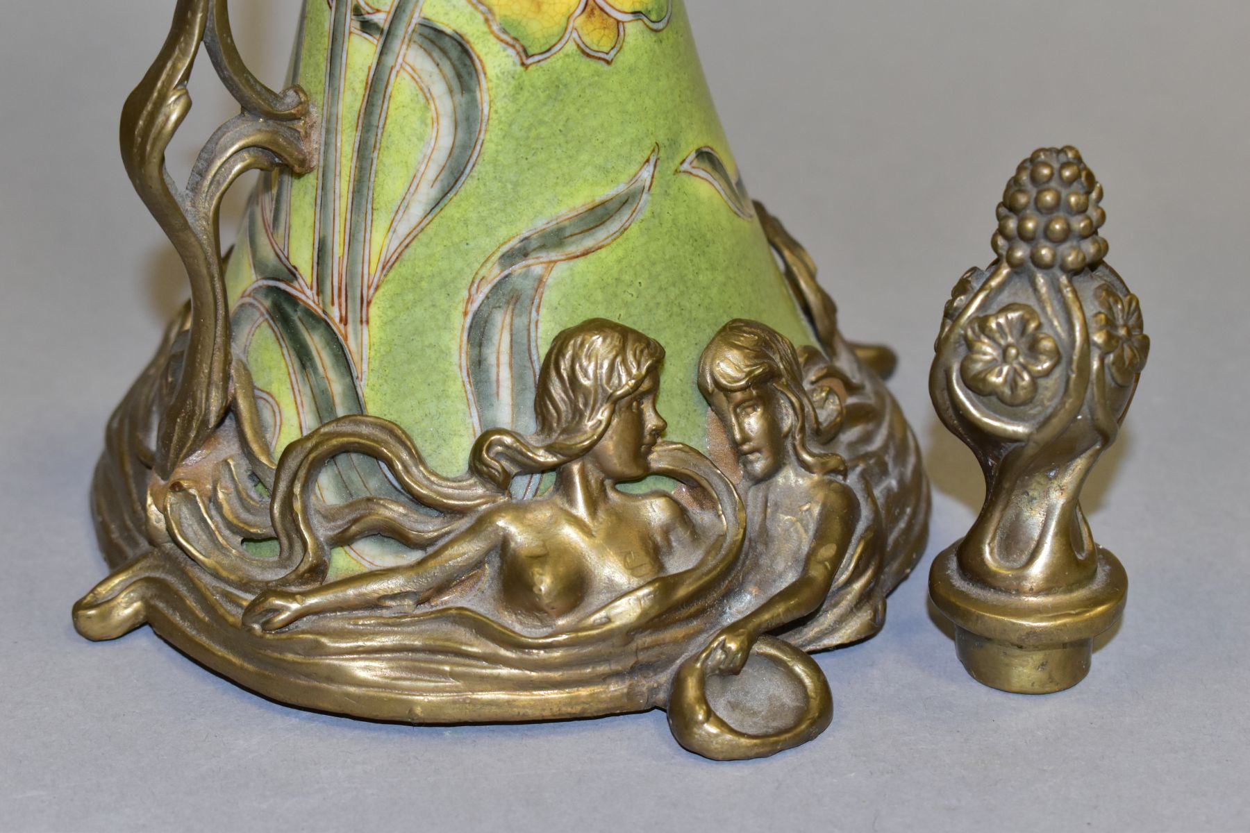 A REPRODUCTION ART NOUVEAU STYLE BRASS MOUNTED CERAMIC EWER, with foliate stopper, the wavy lip with - Image 5 of 7