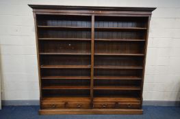 A REPRODUCTION GEORGIAN STYLE MAHOGANY TWIN DIVISION OPEN BOOKCASE, with twelve adjustable shelves