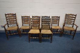 A SET OF EIGHT 19TH CENTURY STYLE RUSH SEATED LADDER BACK CHAIRS