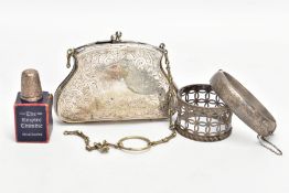 FOUR SILVER AND WHITE METAL ITEMS, to include a silver hinged bangle with engraved scrolling