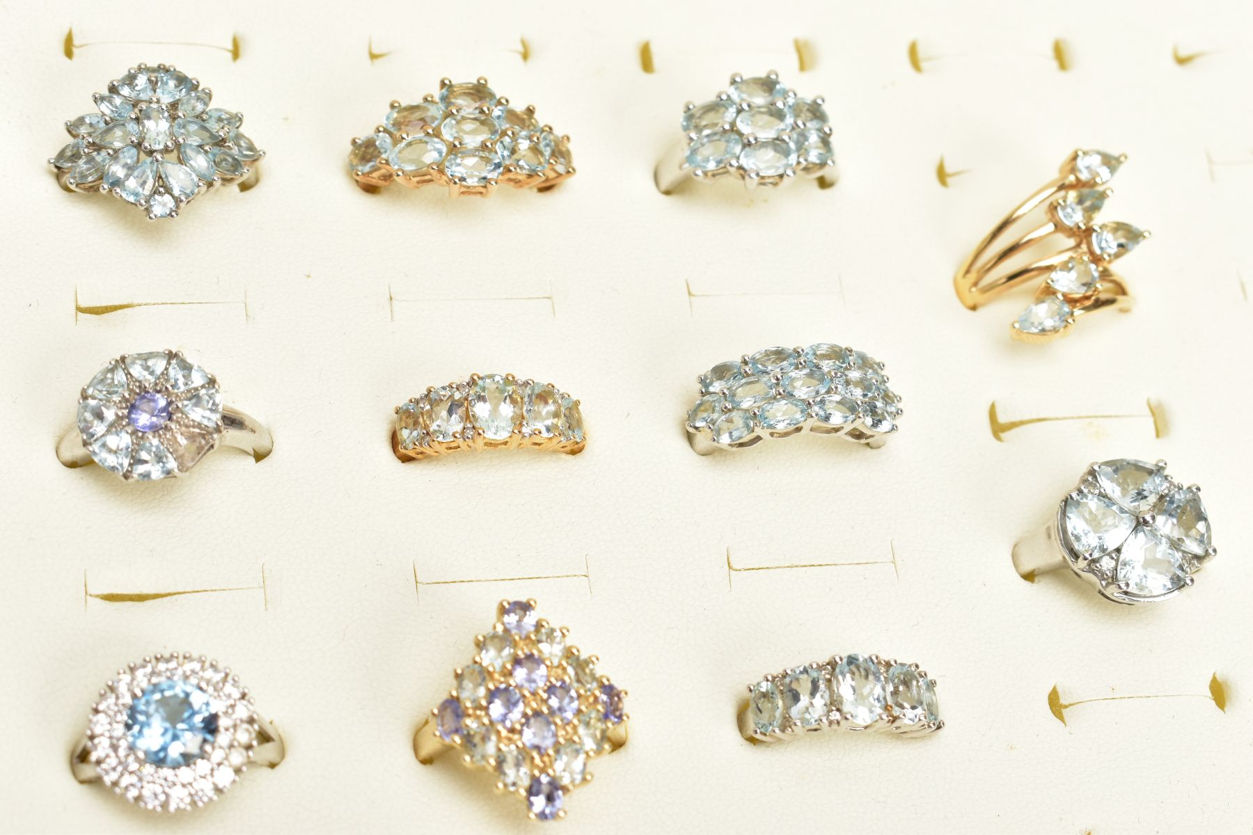 ELEVEN GEM SET RINGS, to include a five stone ring designed as a graduated row of aquamarines, one - Image 2 of 4