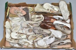 A COLLECTION OF VINTAGE BABIES AND CHILDRENS SHOES, majority are leather and in worn condition,