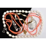 EIGHT PIECES OF JEWELLERY, to include a graduated coral bead necklace, fitted with a brass colour