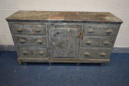 A 19TH CENTURY PAINTED OAK SIDEBOARD, two banks of three drawers flanking a single cupboard door,