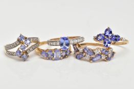 FIVE 9CT GOLD TANZANITE RINGS, five stone tanzanite ring, comprising three oval tanzanite's, two