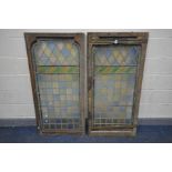 A PAIR OF 19TH CENTURY PINE FRAMED LEAD GLAZED COLOURED WINDOWS, 137cm x 67cm (condition:-one