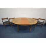 BATH CABINET MAKERS, BCM, A TEAK CIRCULAR EXTENDING DINING TABLE, with one additional fold out leaf,