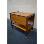 A MID CENTURY TEAK DROP LEAF TEA TROLLEY, on casters, width 69cm x depth 45cm x height 67cm