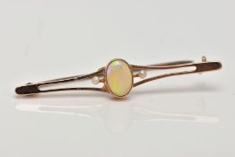 A YELLOW METAL OPAL AND SEED PEARL BAR BROOCH, designed with a central, oval cut opal cabochon