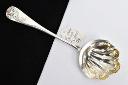 A SILVER ICE CREAM SCOOP, the bowl of a shell shape, shell pattern to the terminal with an