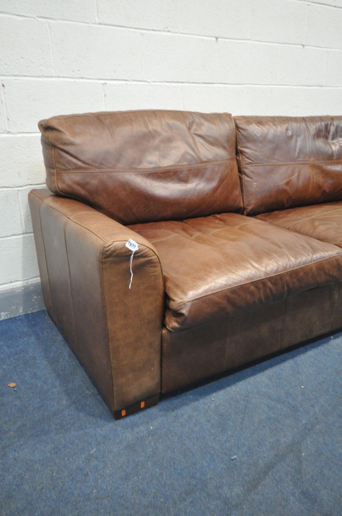 A BROWN LEATHER TWO SEATER SOFA, length 195cm - Image 2 of 2