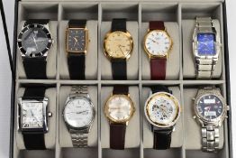 SELECTION OF WATCHES IN A DISPLAY BOX, display box encasing ten watches, names to include Timex,