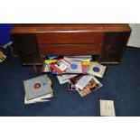 A BUSH SRG142 VINTAGE RADIOGRAM in a teak case fitted with a Garrard 2025 turntable (PAT fail due to