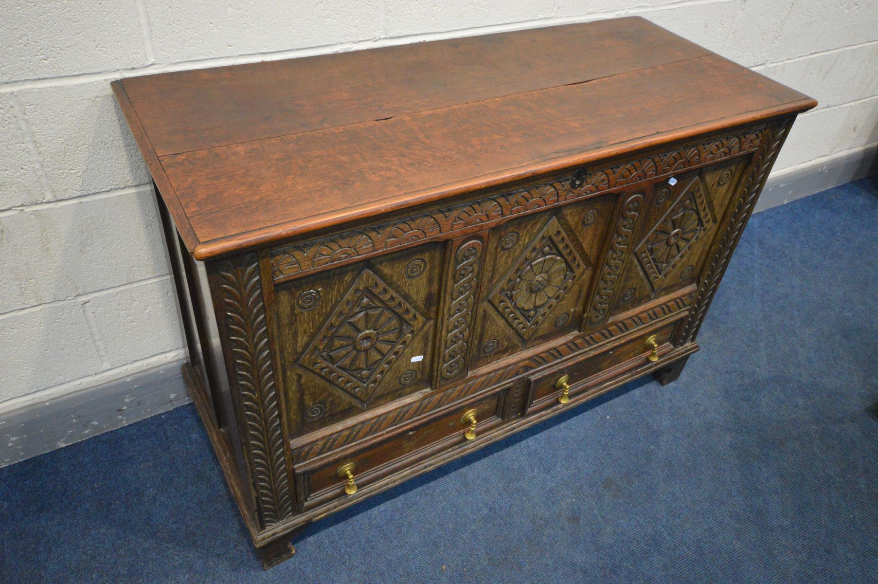 A 19TH CENTURY OAK MULE CHEST, three carved panels above two drawers, width 124cm x depth 52cm x - Image 2 of 4
