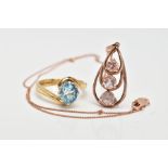 AN 18CT GOLD GEM RING AND A 9CT GOLD GEM PENDANT, the ring designed as an oval aquamarine within