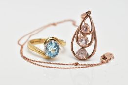 AN 18CT GOLD GEM RING AND A 9CT GOLD GEM PENDANT, the ring designed as an oval aquamarine within