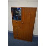 AN AVALON TEAK GENTLEMANS WARDROBE, with an arrangement of drawers and doors, width 92cm x depth