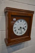 AN 20TH CENTURY SQUARE OAK WALL CLOCK, the glazed door enclosing a later fitted 'The Gledhill-