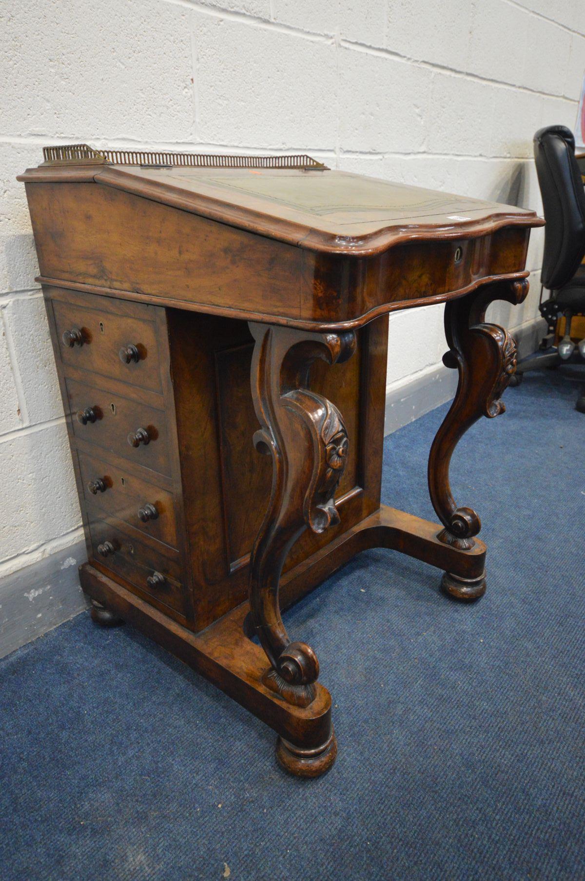 A VICTORIAN WALNUT DAVENPORT, brass gallery to top, a hinged leather tooled inlay lid enclosing a - Image 4 of 4