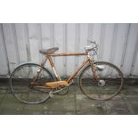 A BROWN GENTLEMANS RALEIGH GRAND TURISMO G.T. 250 BICYCLE, with a 21 inch frame and Sturmey Archer