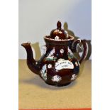 A LATE VICTORIAN BARGEWARE TREACLE GLAZED TEAPOT with applied birds and floral decoration,