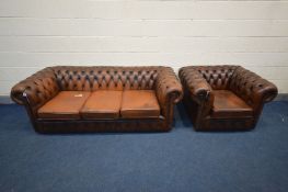 A BROWN LEATHER CHESTERFIELD SUITE, comprising a three seater sofa, length 195cm, and a tub chair,