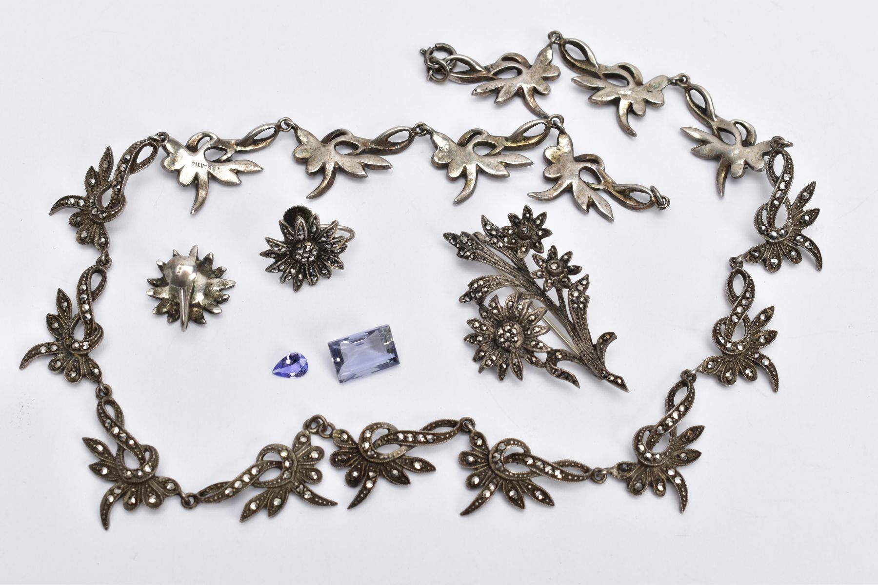 A WHITE METAL MARCASITE NECKLACE, EARRINGS AND A BROOCH, the necklace designed with sixteen floral - Image 2 of 3