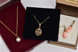 TWO PENDANT NECKLACES AND A PAIR OF CORAL DROP EARRINGS, the first pendant of an oval form, centring