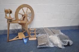 AN ASHFORD OF NEW ZEALAND BEECH SPINNING WHEEL, with accessories, carding wool and bottle of wheel