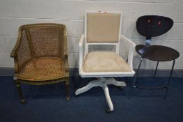 A LOUIS XV STYLE GILTWOOD AND BERGERE ARM CHAIR (condition - front legs and arms slightly