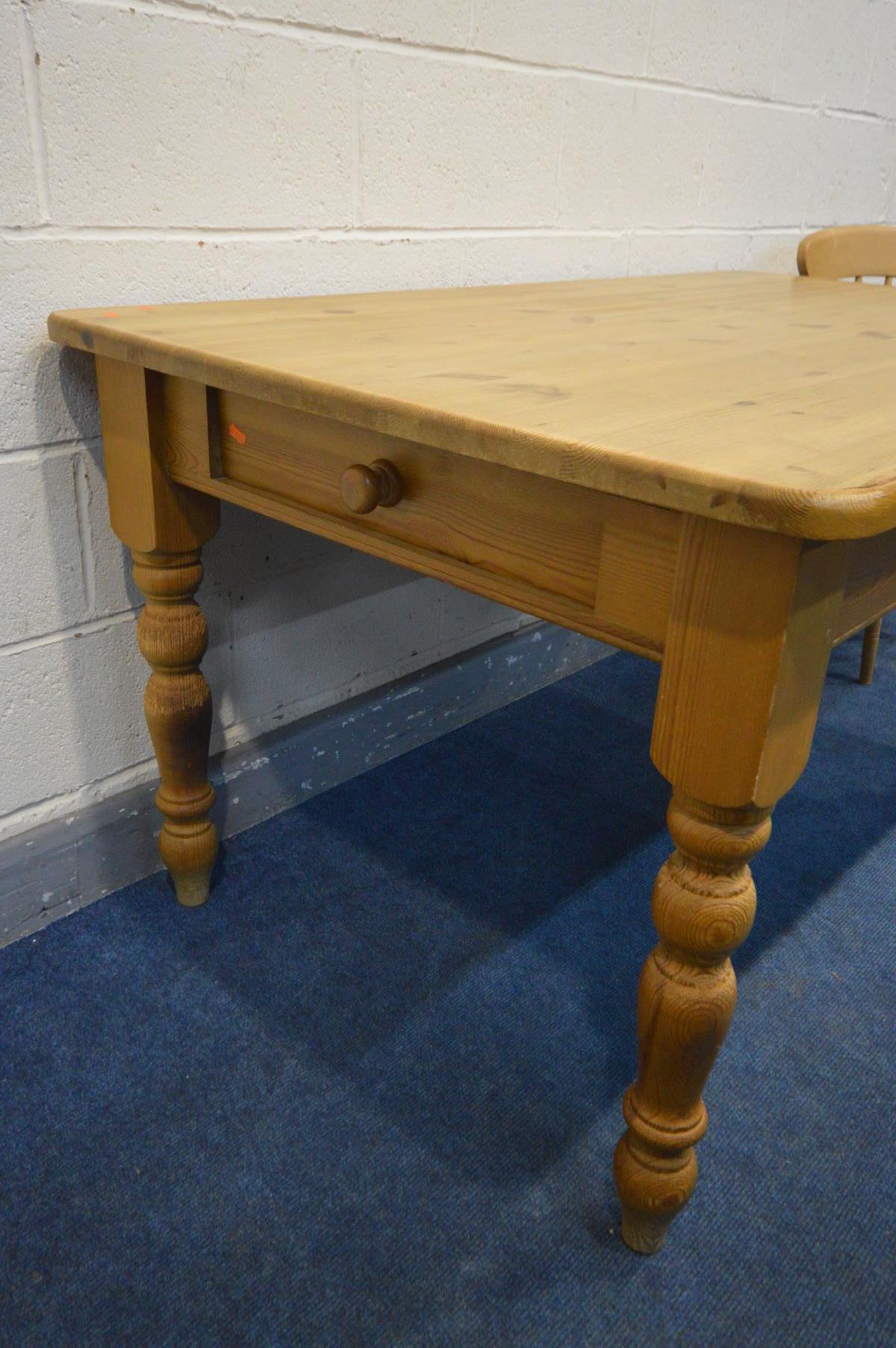 A PINE KITCHEN TABLE with a single drawer, length 153cm x depth 92cm x height 78cm and a beech chair - Image 2 of 3