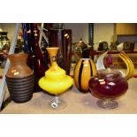 TEN LARGE GLASS VASES, BOWLS, ETC to include two lidded pedestal bowls, a tall red bottle with