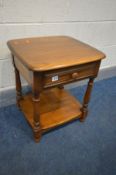 AN ERCOL GOLDEN DAWN LAMP TABLE with a single drawer