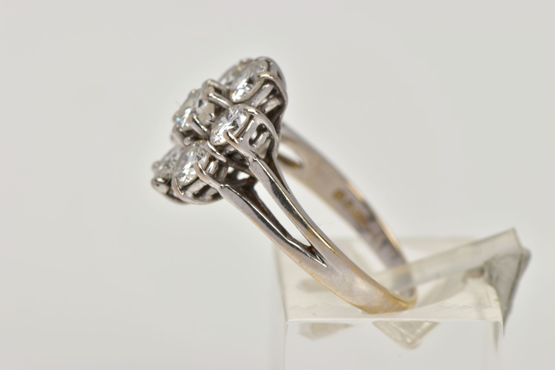 AN 18T WHITE GOLD SEVEN STONE DIAMOND CLUSTER RING, designed as seven claw set brilliant cut - Image 2 of 5