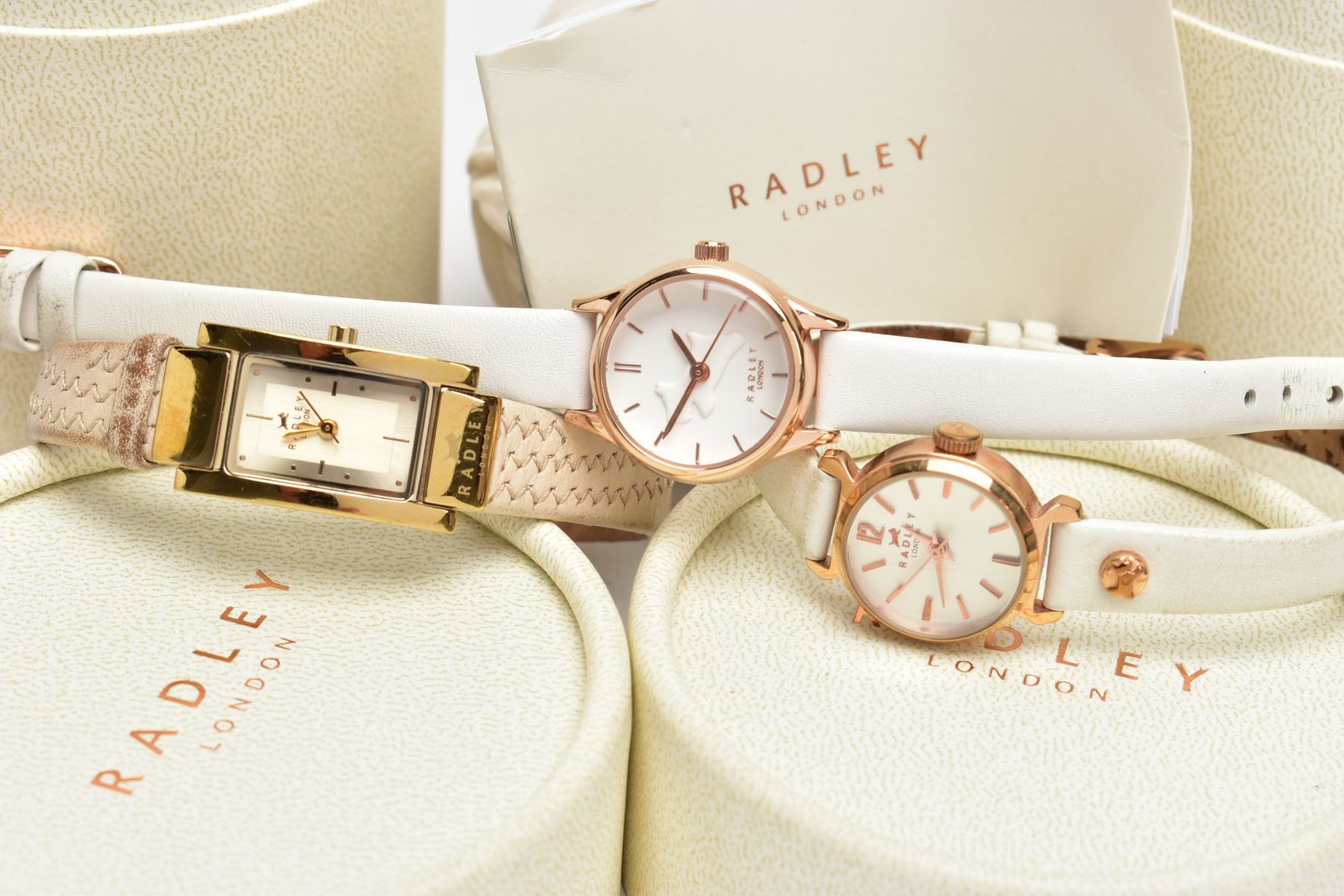 A SELECTION OF RADLEY WATCHES, one white and rose gold coloured watch, white watch face featuring - Image 4 of 4