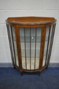 AN EARLY 20TH CENTURY WALNUT DEMI LINE CHINA CABINET, on ball and claw feet, width 91cm x depth 31cm