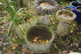 FOUR COMPOSITE GARDEN FEATURES comprising a square tapered planter, width 40cm x height 35cm a