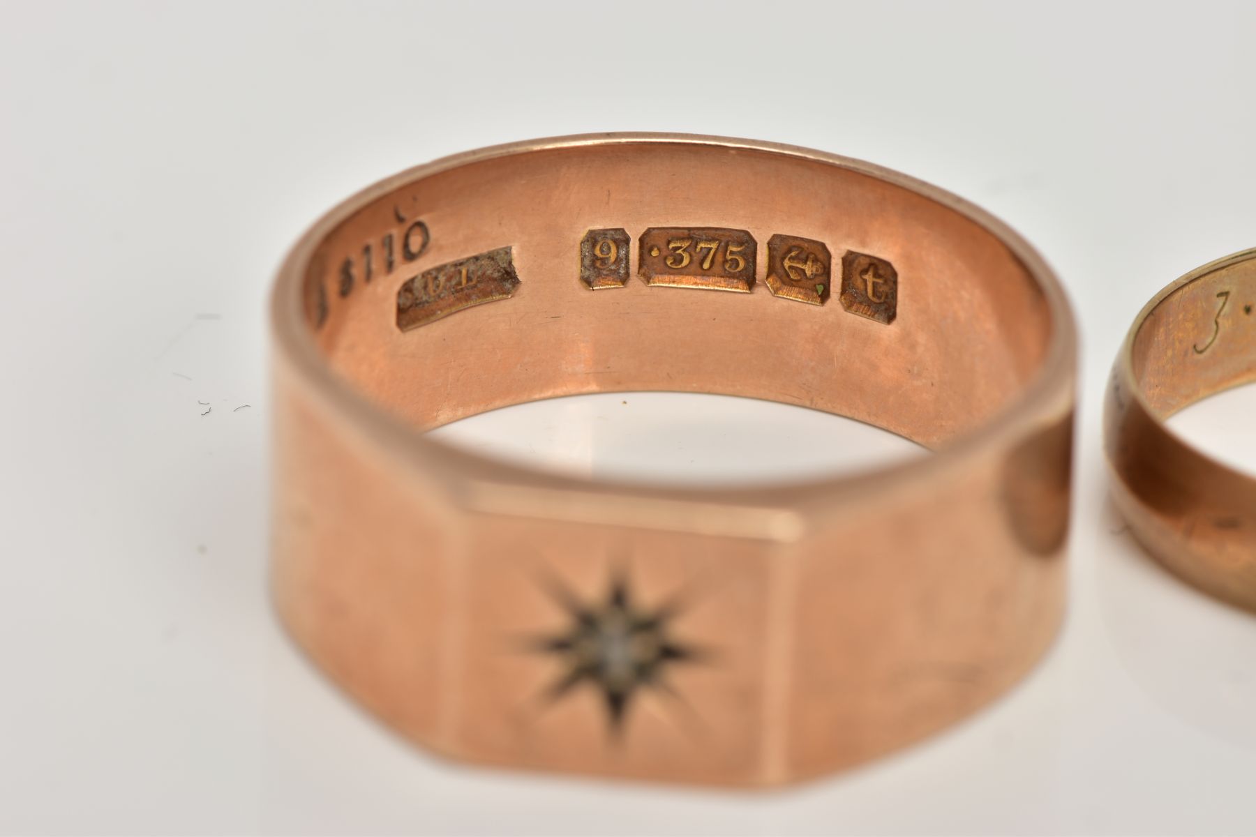 TWO 9CT GOLD RINGS, the first a signet ring with a rough cut diamond star set to the centre, ring - Image 2 of 3