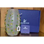 A BOXED SWAROVSKI LEAVES VASE, frosted glass vase in a sleeve of Swarovski crystals shaped as leaves